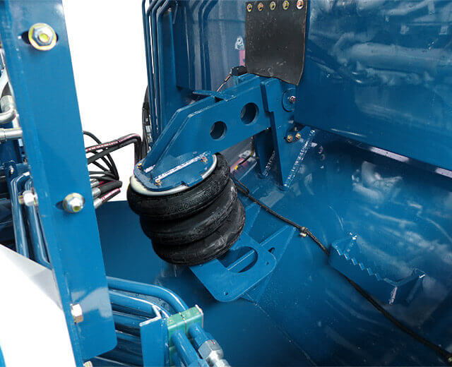 A close-up view of a Peterson Horizontal Grinder's Impact Release System airbag from a 4710D