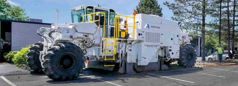 Roadtec SX-6 Soil Stabilizer/Reclaimer reclaiming an asphalt surface