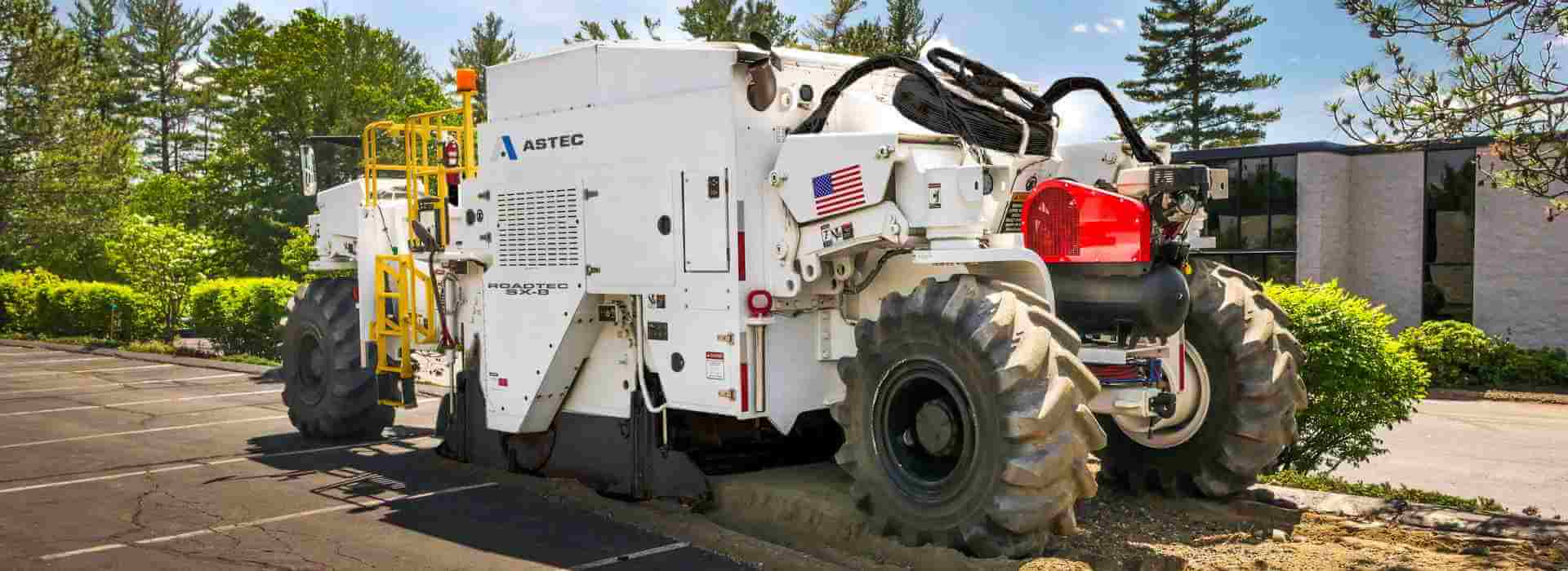 Roadtec SX-8 Soil Stabilizer/Reclaimer reclaiming an asphalt surface